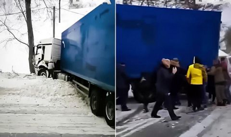 Яки руски шофьори преместиха камион с голи ръце, пречил им на пътя ВИДЕО